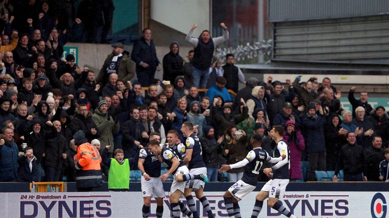 Millwall's Shaun Hutchinson celebrates scoring his side's first goal of the game with his team-mates