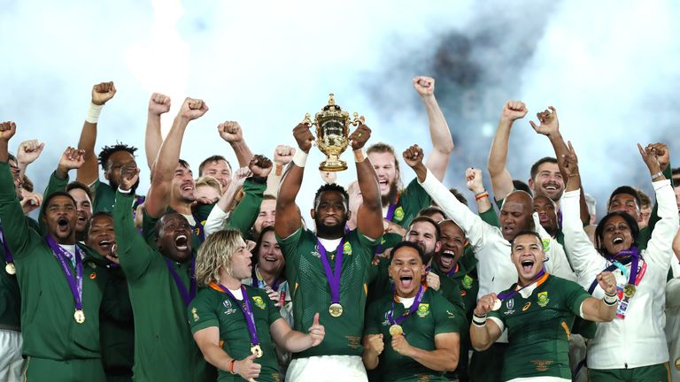 Siya Kolisi of South Africa lifts the Web Ellis cup following his team's victory against England