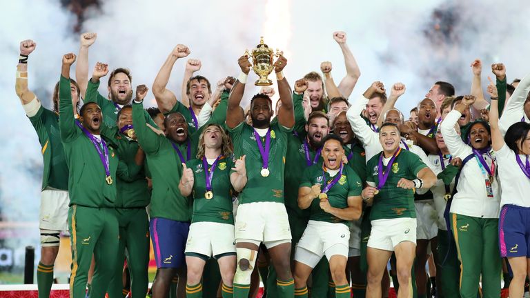 Siya Kolisi of South Africa lifts the Webb Ellis Cup following his team's victory against England in the Rugby World Cup 2019 Final