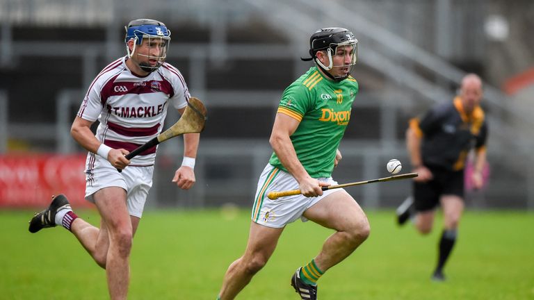 Kevin McKeague of Dunloy in action against Meehaul McGrath of Slaughtneil