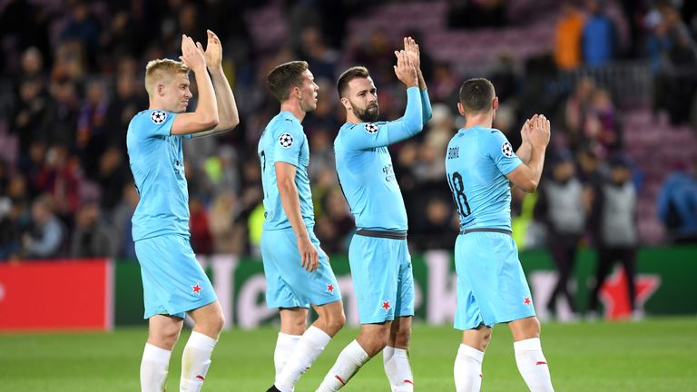 Slavia Prague players applaud their travelling fans following their 0-0 draw at the Nou Camp