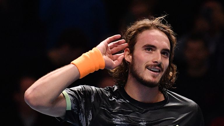 Stefanos Tsitsipas celebrates victory against Switzerland's Roger Federer during the men's singles semi-final match on day seven of the ATP World Tour Finals tennis tournament at the O2 Arena in London on November 16, 2019. - Greece's Stefanos Tsitsipas beat Switzerland's Roger Federer 6-3; 6-4.