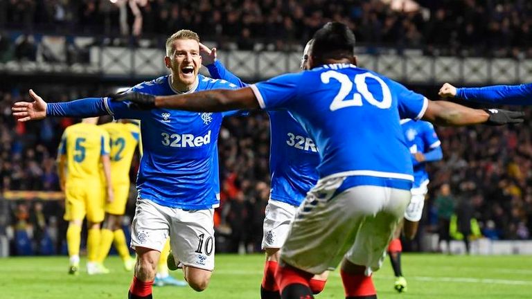 Steven Davis celebrates his goal with Morelos