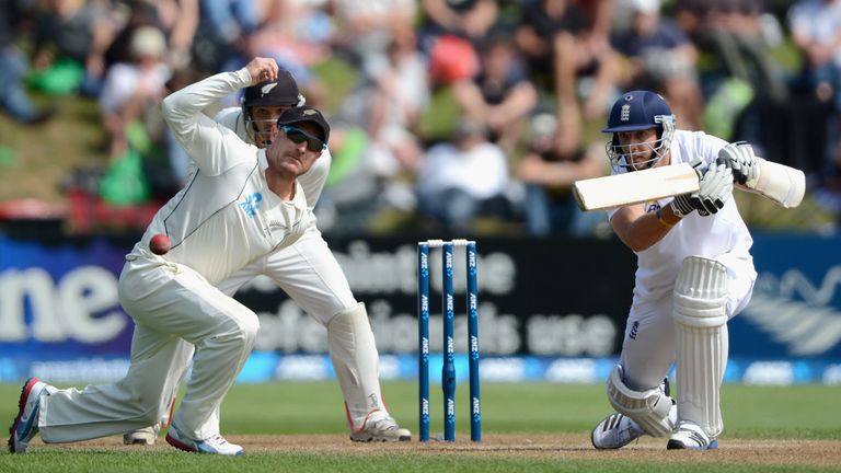 Steven Finn drives on day five of the first Test against New Zealand at Dunedin in 2013