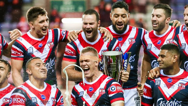 Picture by Alex Whitehead/SWpix.com - 17/02/2019 - Rugby League - Betfred World Club Challenge - Wigan Warriors v Sydney Roosters - DW Stadium, Wigan, England - Sydney Roosters' celebrate winning the World Club Challenge.