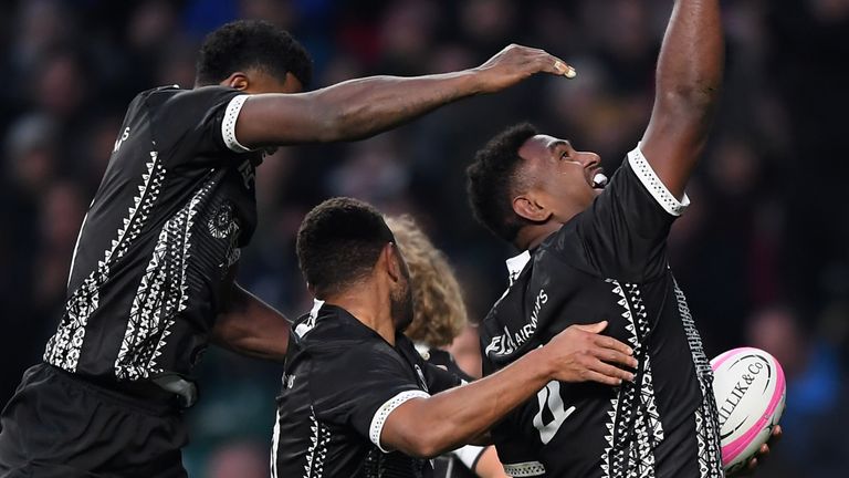 Temo Mayanavanua of Fiji celebrates scoring 