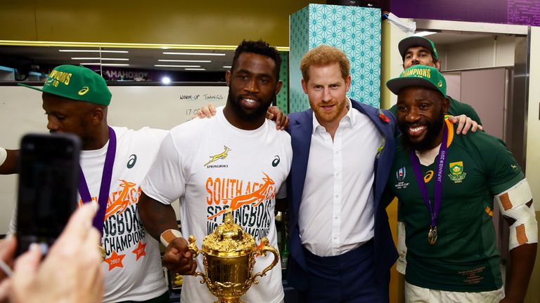 Prince Harry with Siya Kolisi and Tendai Mtawarira