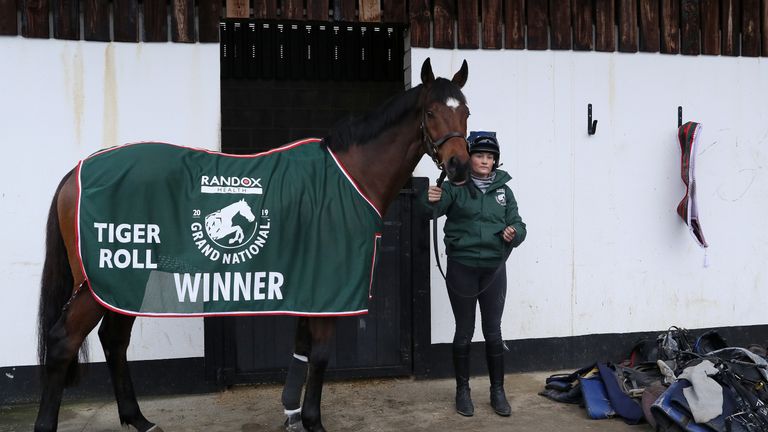 Two time Grand National winner Tiger Roll with groom Louise Magee during the stable visit to Gordon Elliott's yard at Cullentra House, Co. Meath.