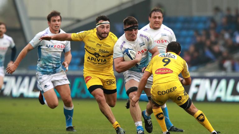 SALFORD, ENGLAND - NOVEMBER 24: Tom Curry of Sale Sharks takes on Alexi Bales during the Heineken Champions Cup Round 2 match between Sale Sharks and La Rochelle at AJ Bell Stadium on November 24, 2019 in Salford, England. (Photo by David Rogers/Getty Images)