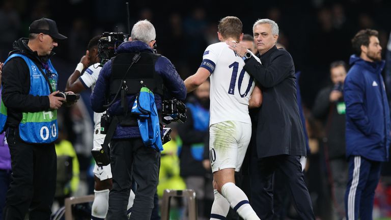 Tottenham Hotspur manager Jose Mourinho embraces Harry Kane 