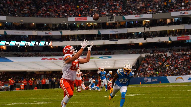 Travis Kelce runs a touchdown during the 2019 NFL week 11 regular season football game between Kansas City Chiefs and Los Angeles Chargers