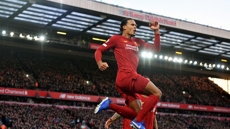 Virgil van Dijk celebrates scoring his first goal against Brighton