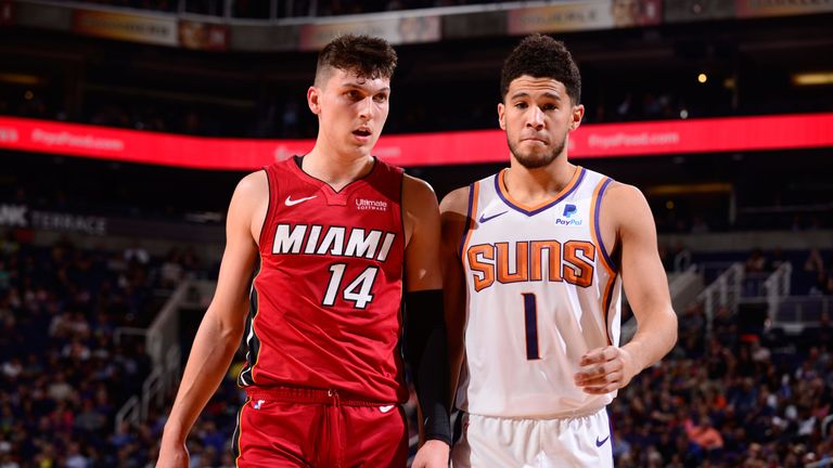 Tyler Herro and Devin Booker match up during the Heat&#39;s win over the Suns