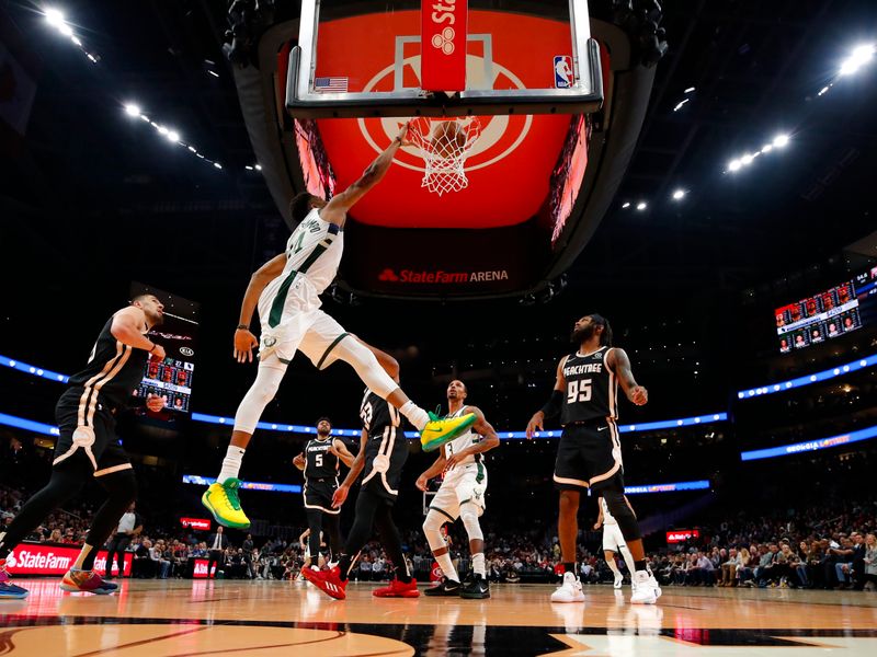 Utah Jazz forward Bojan Bogdanovic (44) celebrates with Mike Conley (10)  during the fourth quarter against the Minnesota Timberwolves in an NBA  basketball game Wednesday, Nov. 20, 2019, in Minneapolis. Utah won