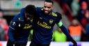 Arsenal rescue top spot with draw in Liege