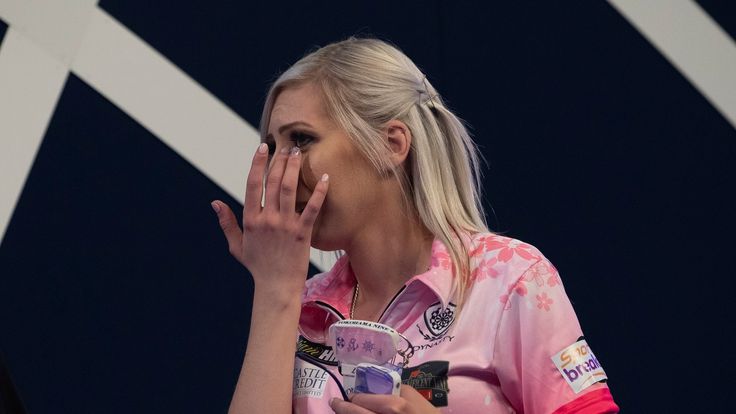 Fallon Sherrock wipes away a tear after winning her second round match at the 2020 PDC World Darts Championship