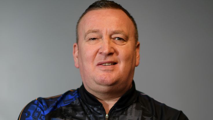 Glen Durrant poses for a photo during a Media Opportunity for the William Hill World Darts Championship on November 25, 2019 in London, England. 