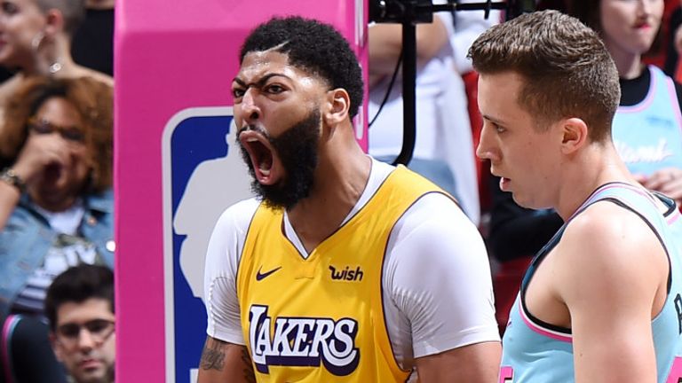 Anthony Davis celebrates a basket against the Miami Heat