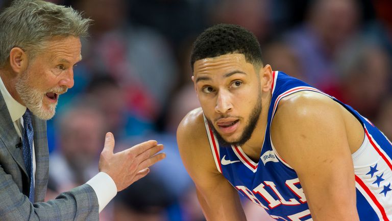 Brett Brown speaks to Ben Simmons during a game