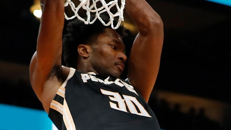 Damian Jones dunks against the Golden State Warriors