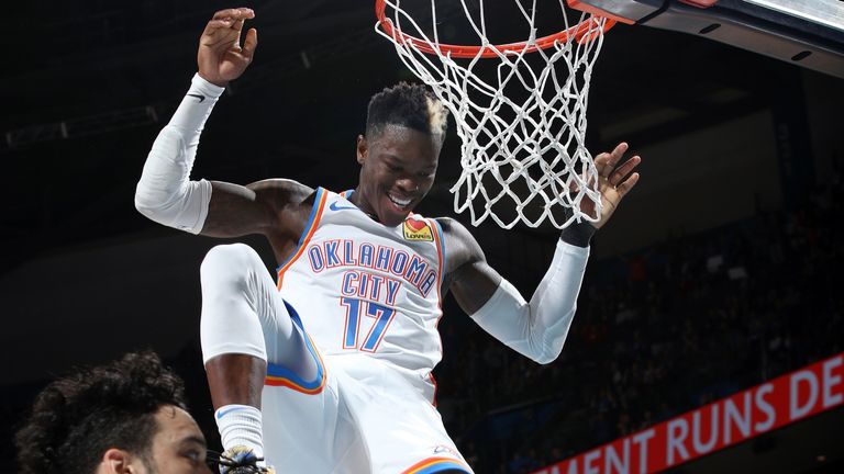 Dennis Schroder finishes off a dunk against Memphis