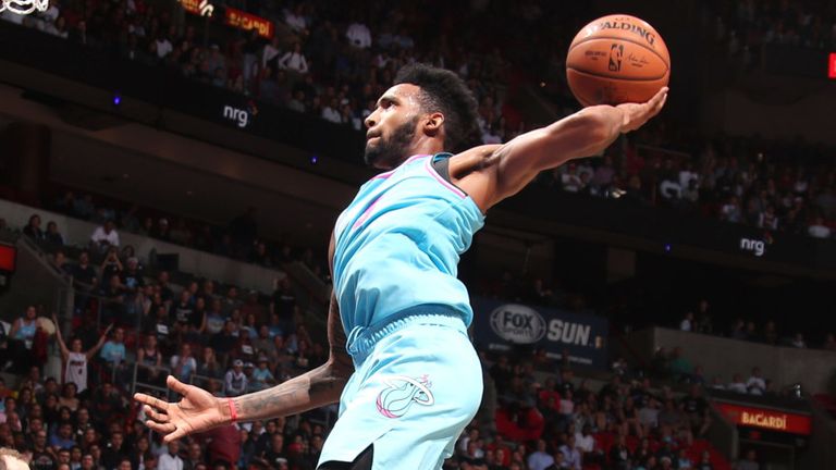 Derrick Jones Jr takes flight for a dunk against the Miami Heat