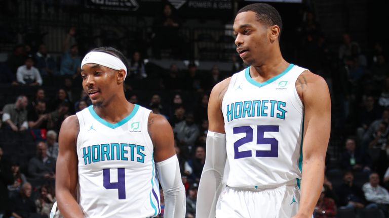 Devonte' Graham and PJ Washington in action for the Charlotte Hornets