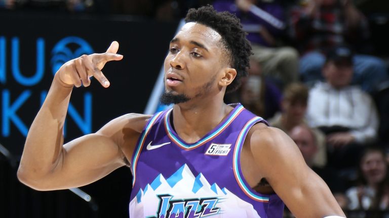 Donovan Mitchell celebrates after draining a three-pointer against the Portland Trail Blazers