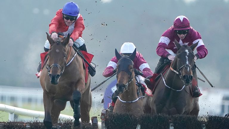 RATOATH, IRELAND - DECEMBER 01: Davy Russell riding Envoi Allen (L, red) clear the last to win The baroneracing.com Royal Bond Novice Hurdle from Abacadabras and Jack Kennedy (maroon cap) at Fairyhouse Racecourse on December 01, 2019 in Ratoath, Ireland. (Photo by Alan Crowhurst/Getty Images)