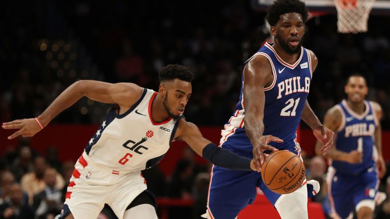 Troy Brown Jr takes steals the ball from Joel Embiid