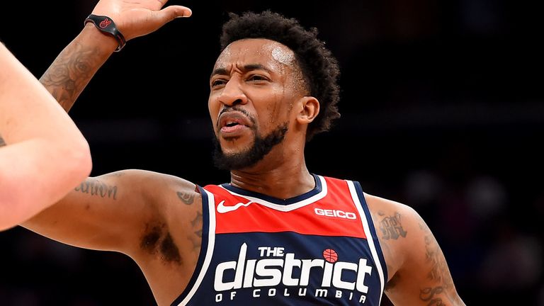 Jordan McRae high-fives a team-mate during the Wizards' win over the Heat