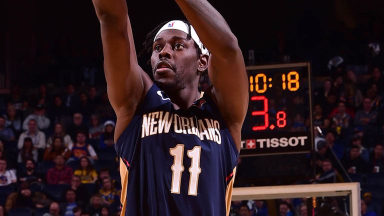 Jrue Holiday fires from long-range against Golden State