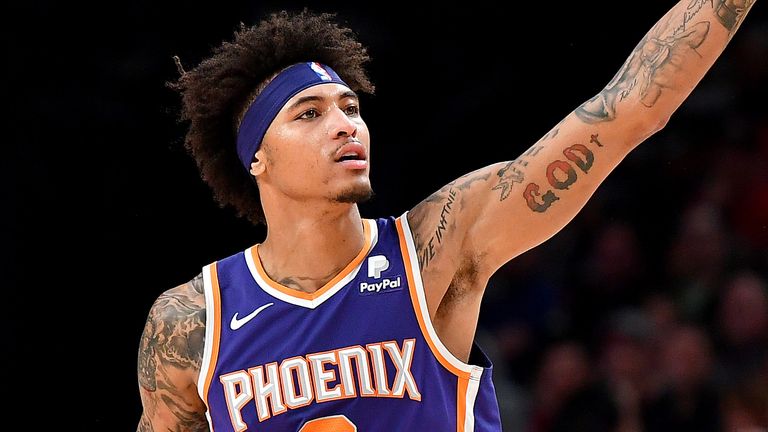 Kelly Oubre salutes the crowd during his three-point barrage against Portland