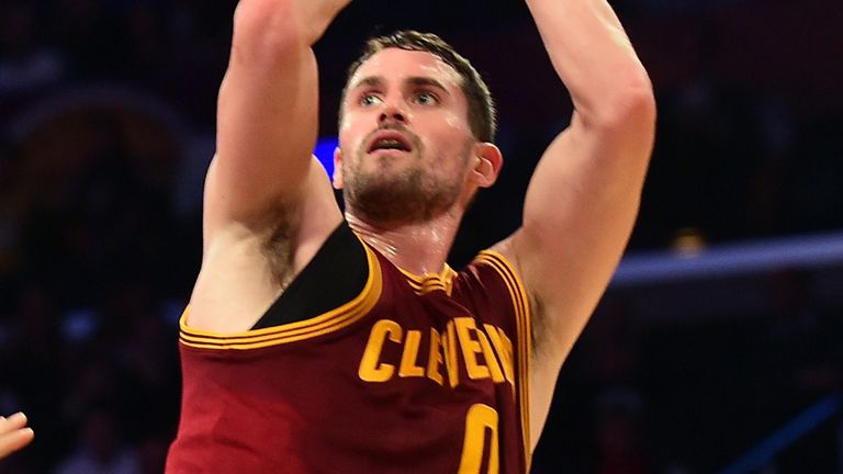 Kevin Love shoots  a fadeaway jump shot for the Cavaliers