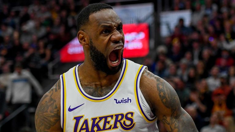 LeBron James roars in celebration during the Los Angeles Lakers&#39; win over the Utah Jazz
