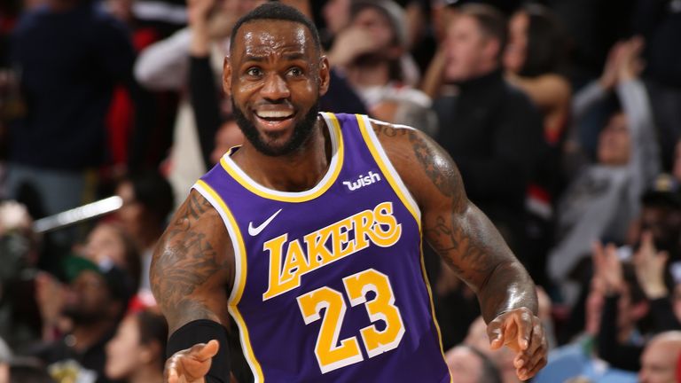 LeBron James celebrates a play during the Lakers&#39; win over Portland