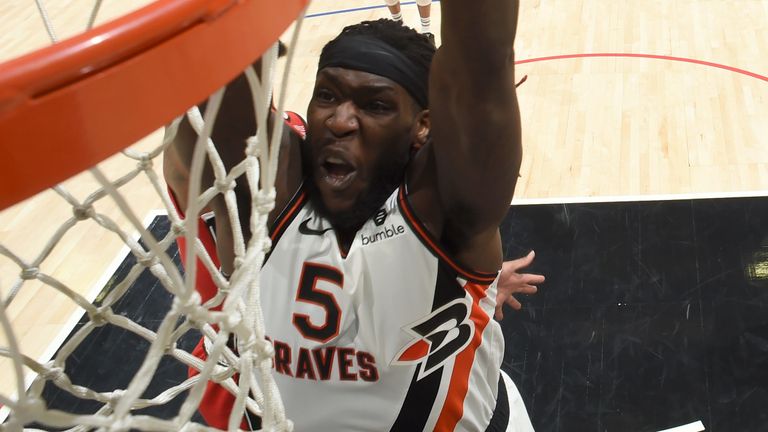 Montrezl Harrell throws down a dunk en route to 26 points against Portland
