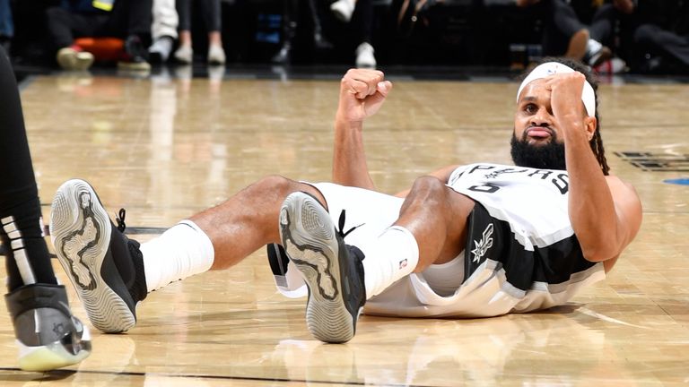 Patty Mills celebrates a basket after being fouled in the Spurs' win over the Nets