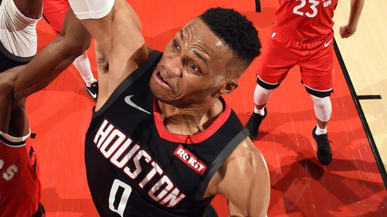 Russell Westbrook scores with a dunk during the Rockets' win over the Raptors