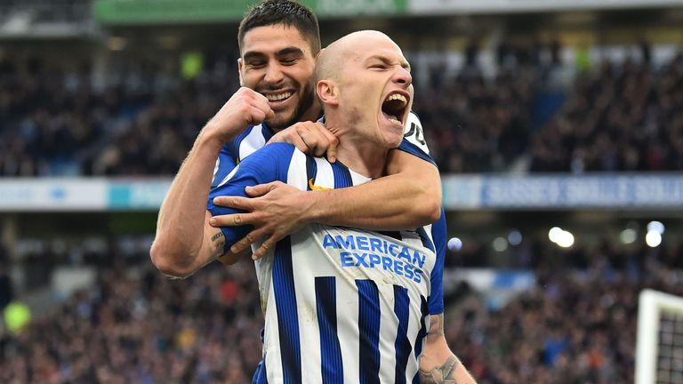 Aaron Mooy celebrates after doubling Brighton's lead