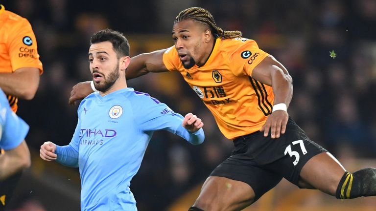 Adama Traore of Wolverhampton Wanderers scores his side's first goal against Manchester City