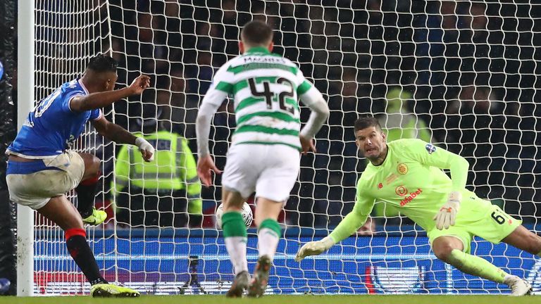 Celtic&#39;s Fraser Forster saves an Alfredo Morelos penalty in the Scottish League Cup final