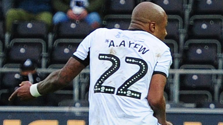 SWANSEA, WALES - DECEMBER 14: Andre Ayew of Swansea City scores the opening goal during the Sky Bet Championship match between Swansea City and Middlesbrough at the Liberty Stadium on December 14, 2019 in Swansea, Wales. (Photo by Athena Pictures/Getty Images)