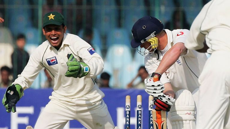 Pakistan bowler Danish Kaneria bowls England batsman Andrew Flintoff during the Fifth and Final Day of the Third and Final Test Match between Pakistan and England at The Gaddafi Stadium on December 3, 2005 in Lahore, Pakistan. (Photo by Stu Forster/Getty Images)