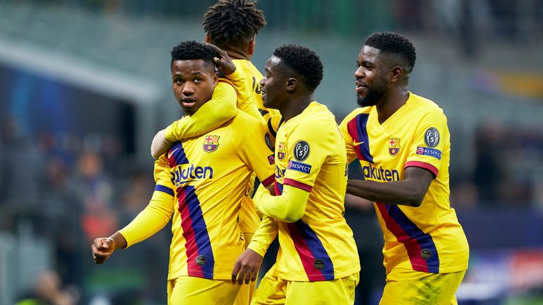 Barcelona players celebrate with team-mate Ansu Fati after his goal