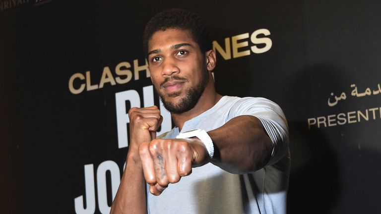 British heavyweight boxing challenger Anthony Joshua arrives for a press conference in the Saudi capital Riyadh on December 2, 2019, ahead of the upcoming &#34;Clash on the Dunes&#34;. - The &#34;Clash on the Dunes&#34; fight is scheduled to take place in Diriya on December 7m between Andy Ruiz Jr and Anthony Joshua.