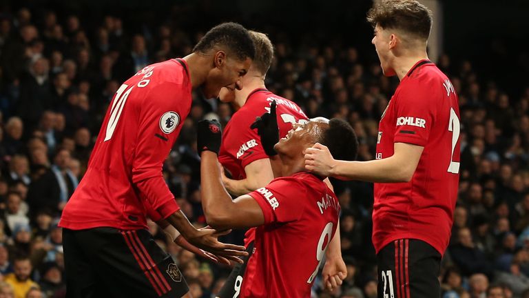 Anthony Martial celebrates doubling Manchester United's lead