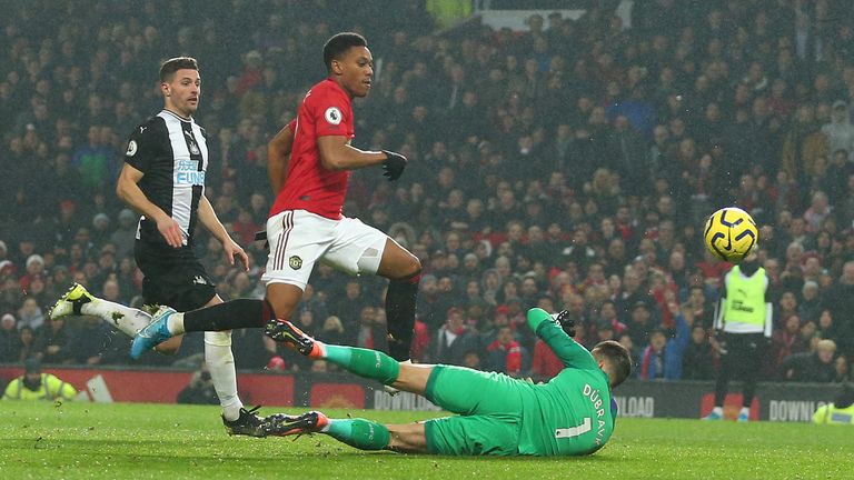 Anthony Martial chips Martin Dubravka to make it 4-1 to the home side