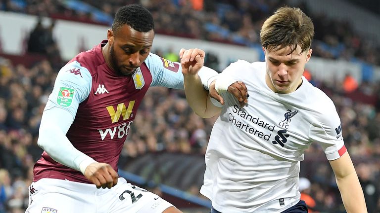 Aston Villa's Jonathan Kodija is challenged by Liverpool's Morgan Boyes