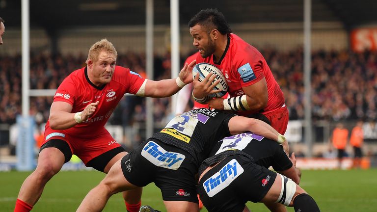 Billy Vunipola is tackled by Luke Cowan-Dickie and Dave Dennis